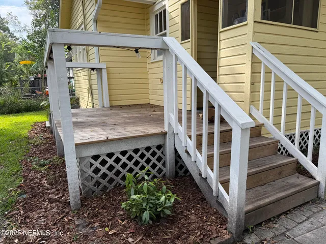 a view of a park with swings and slides
