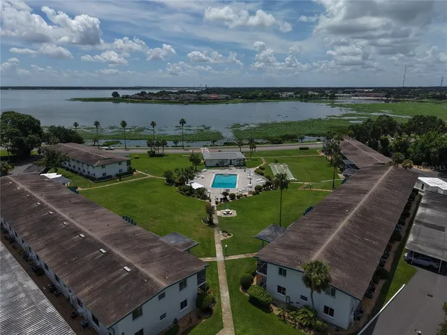an aerial view of a house with a garden