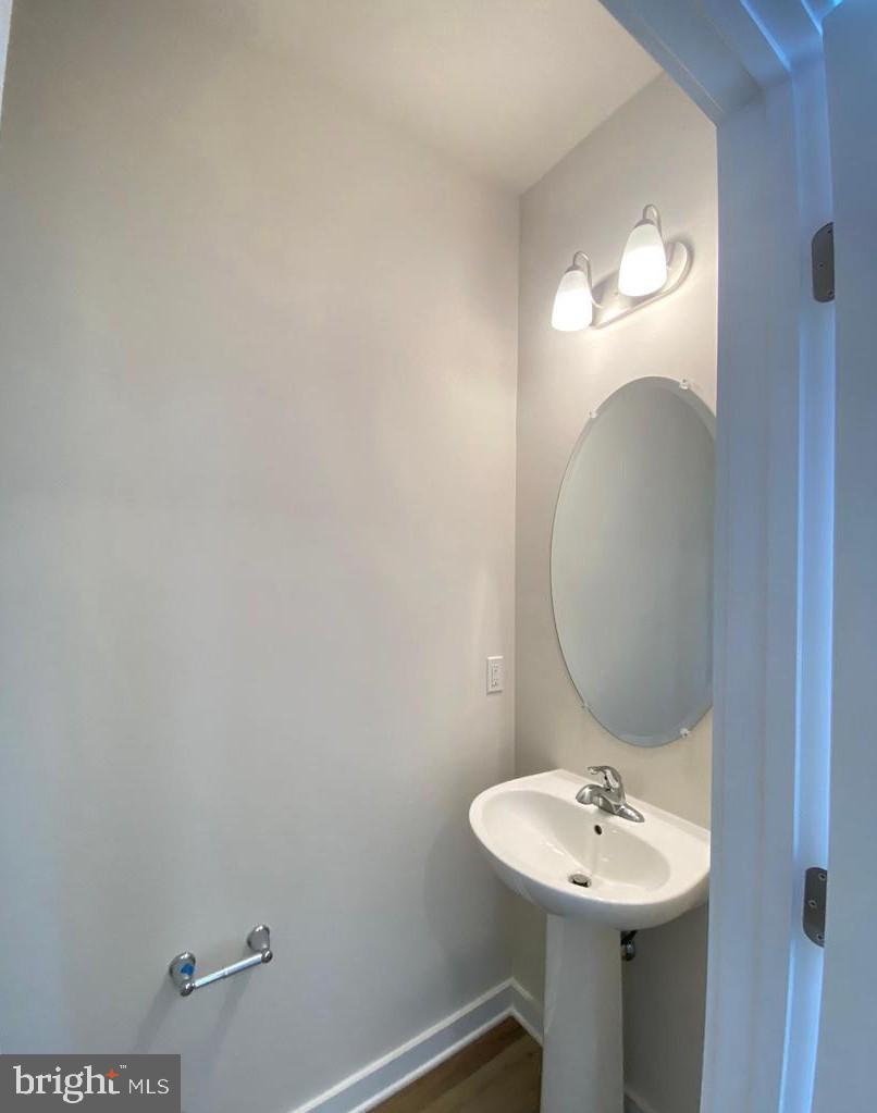 3639 Stone Barn Drive Frederick, MD 21704 - Photo 12 of 21 a bathroom with a sink and a mirror