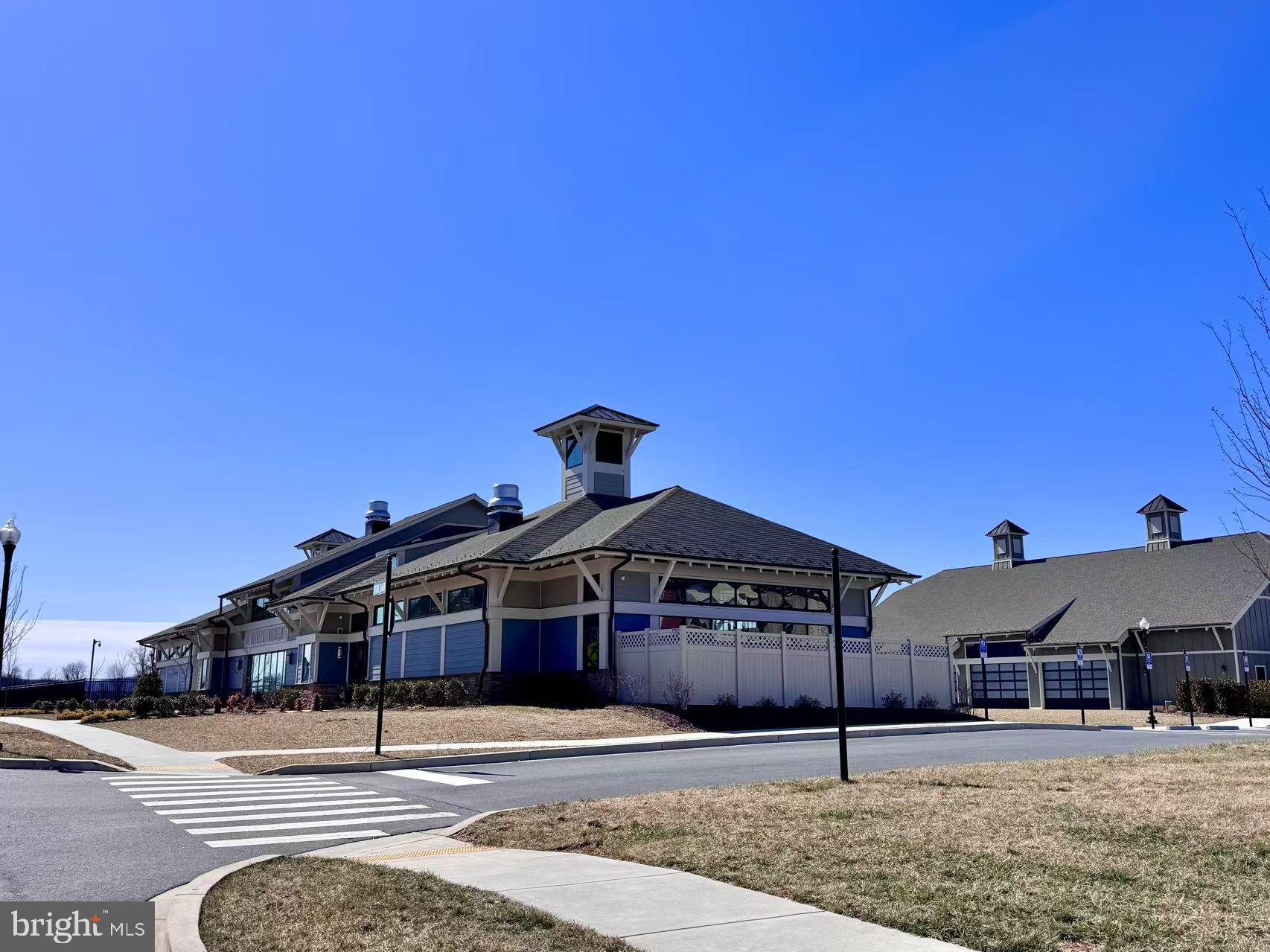 3639 Stone Barn Drive Frederick, MD 21704 - Photo 16 of 21 a front view of a house with a yard