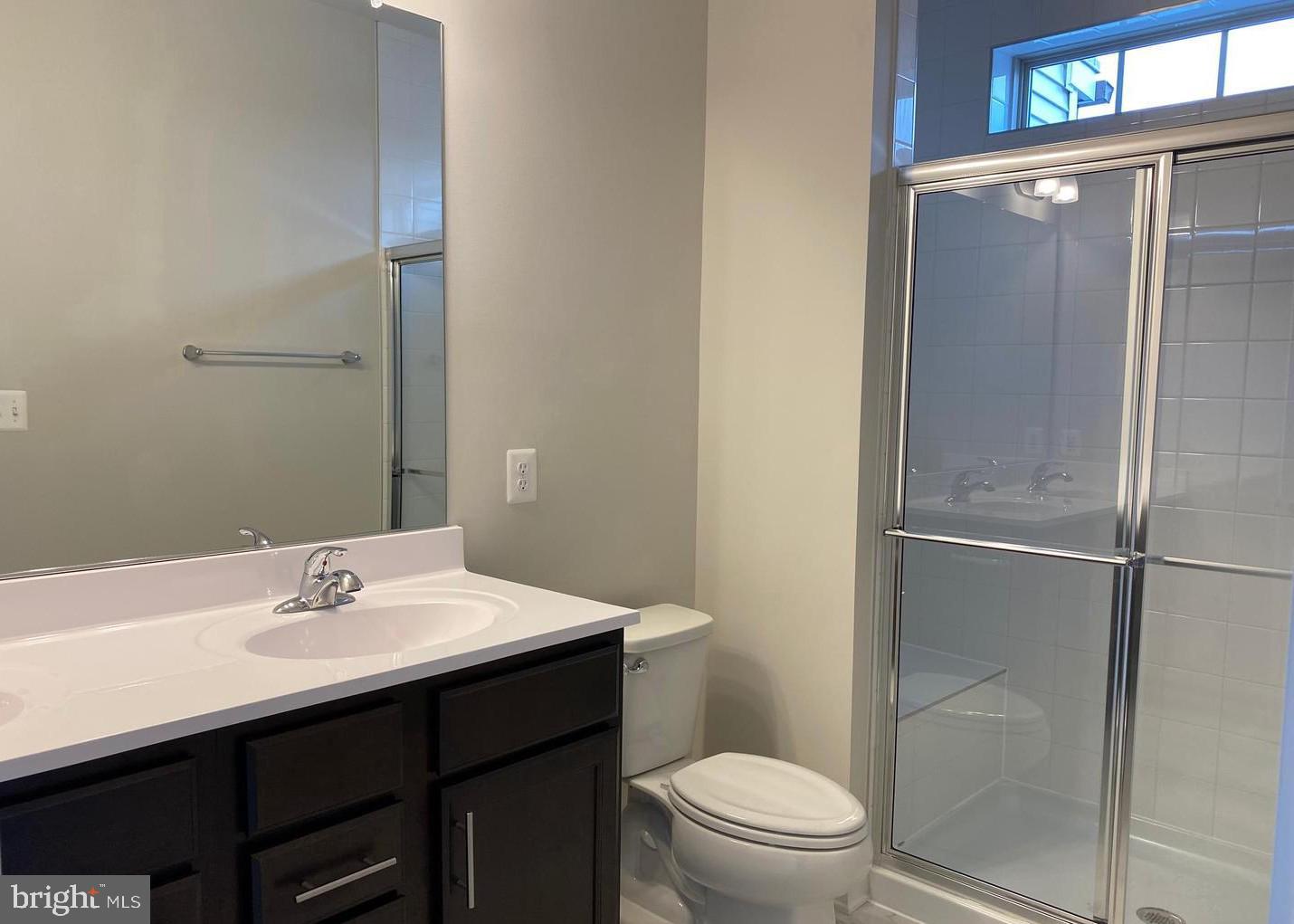 3639 Stone Barn Drive Frederick, MD 21704 - Photo 10 of 21 a bathroom with a sink toilet and shower