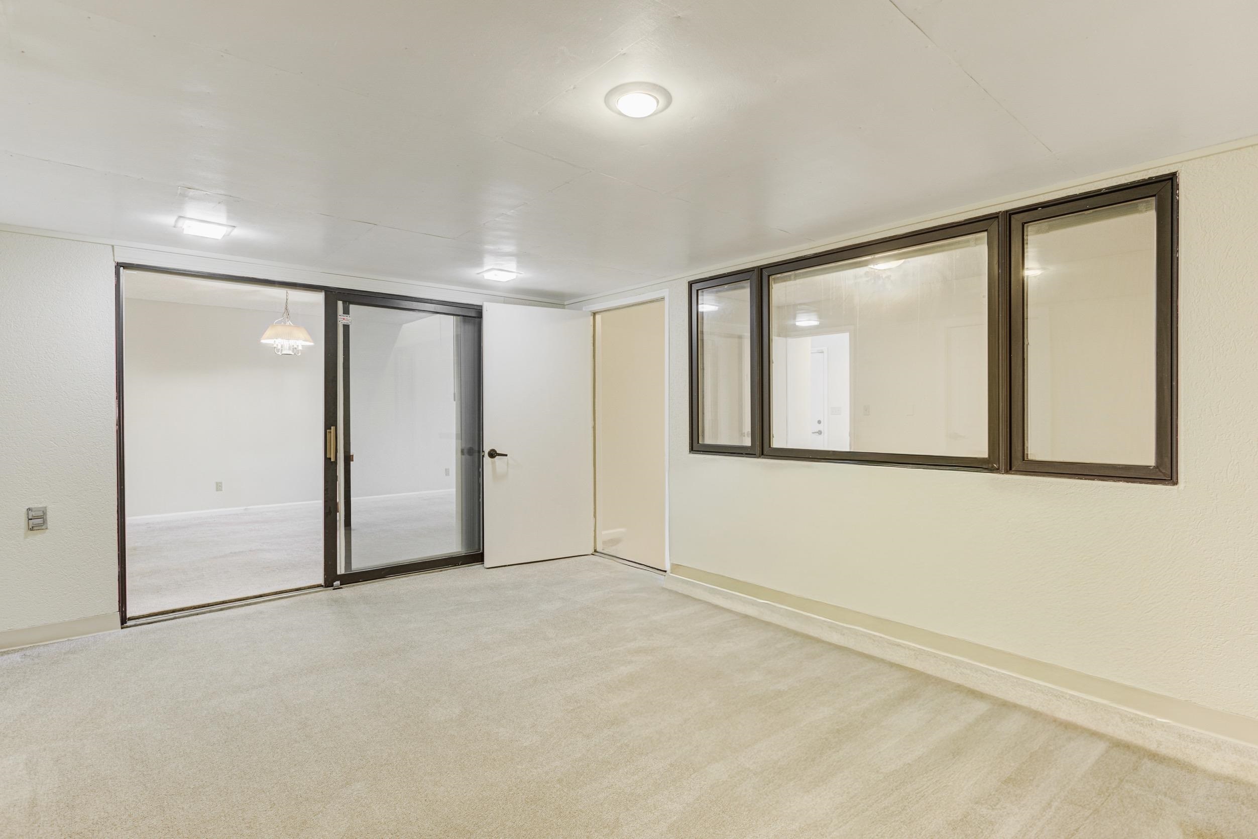 5013 Scheibler Road, Unit C1 Memphis, TN 38128 - Photo 18 of 36 Unfurnished room featuring carpet floors and baseboards