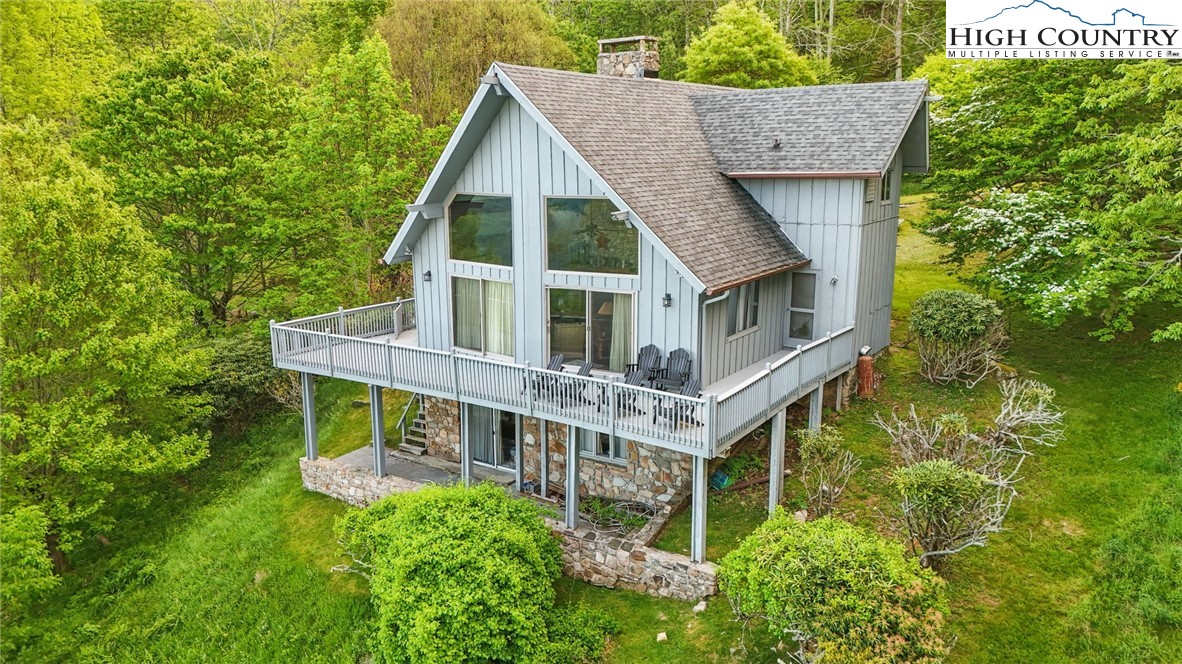 178 Buckeye Lane Seven Devils, NC 28604 - Photo 6 of 9 aerial view of a house with balcony