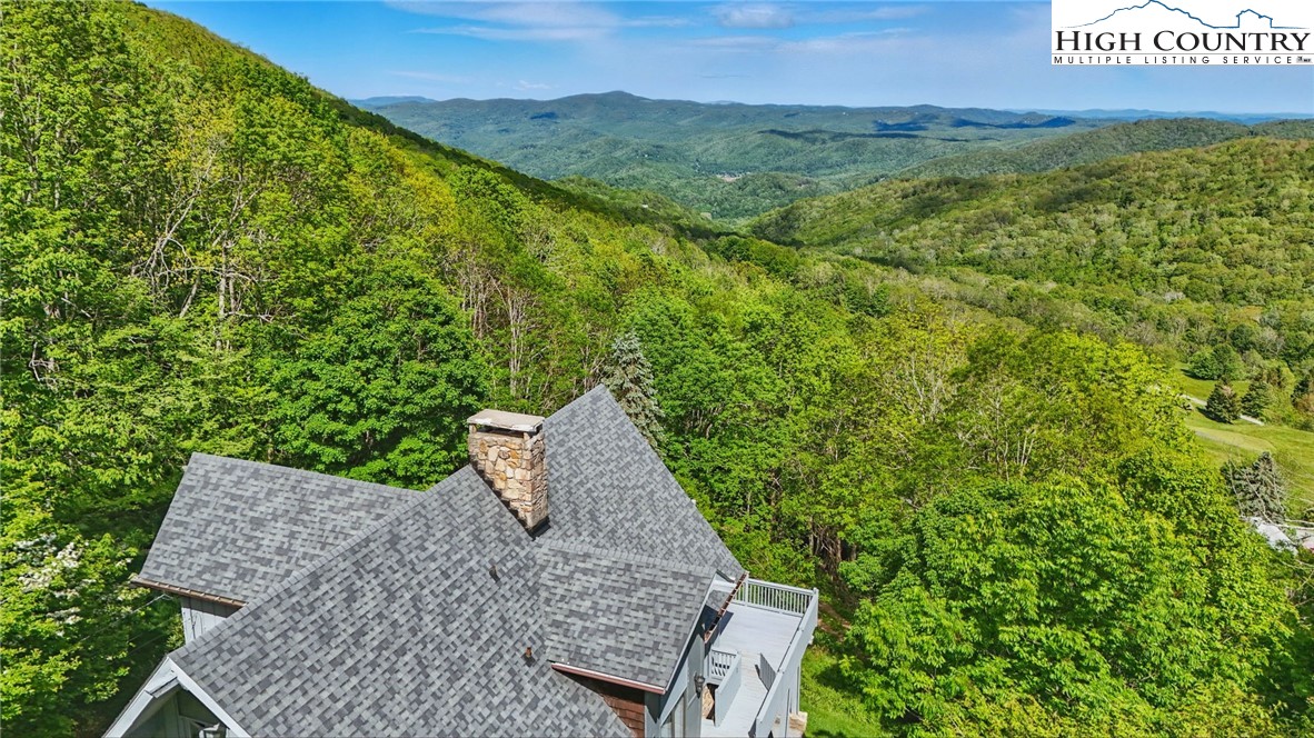 178 Buckeye Lane Seven Devils, NC 28604 - Photo 7 of 9 a view of a field with an trees