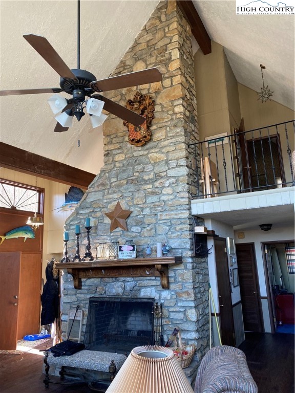 178 Buckeye Lane Seven Devils, NC 28604 - Photo 9 of 9 a living room with furniture and a fireplace