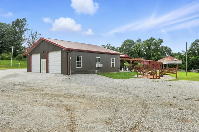 a lobby with furniture and a large window