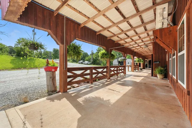 a bathroom with double vanity and a mirror