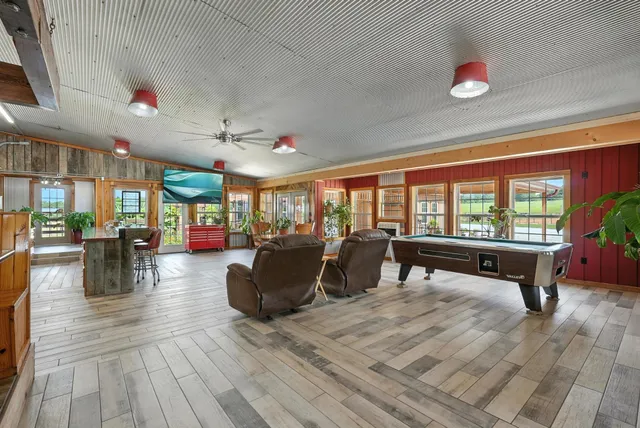 a view of a two chairs in the roof deck