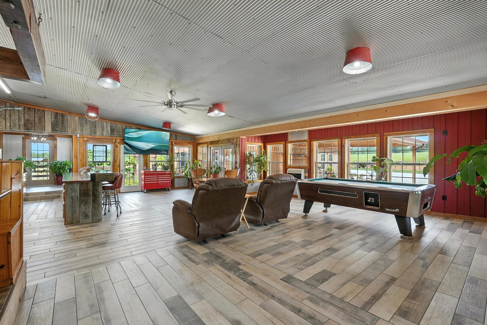 1880 Clydeton Road Waverly, TN 37185 - Photo 40 of 85 a living room with furniture a rug and a large window