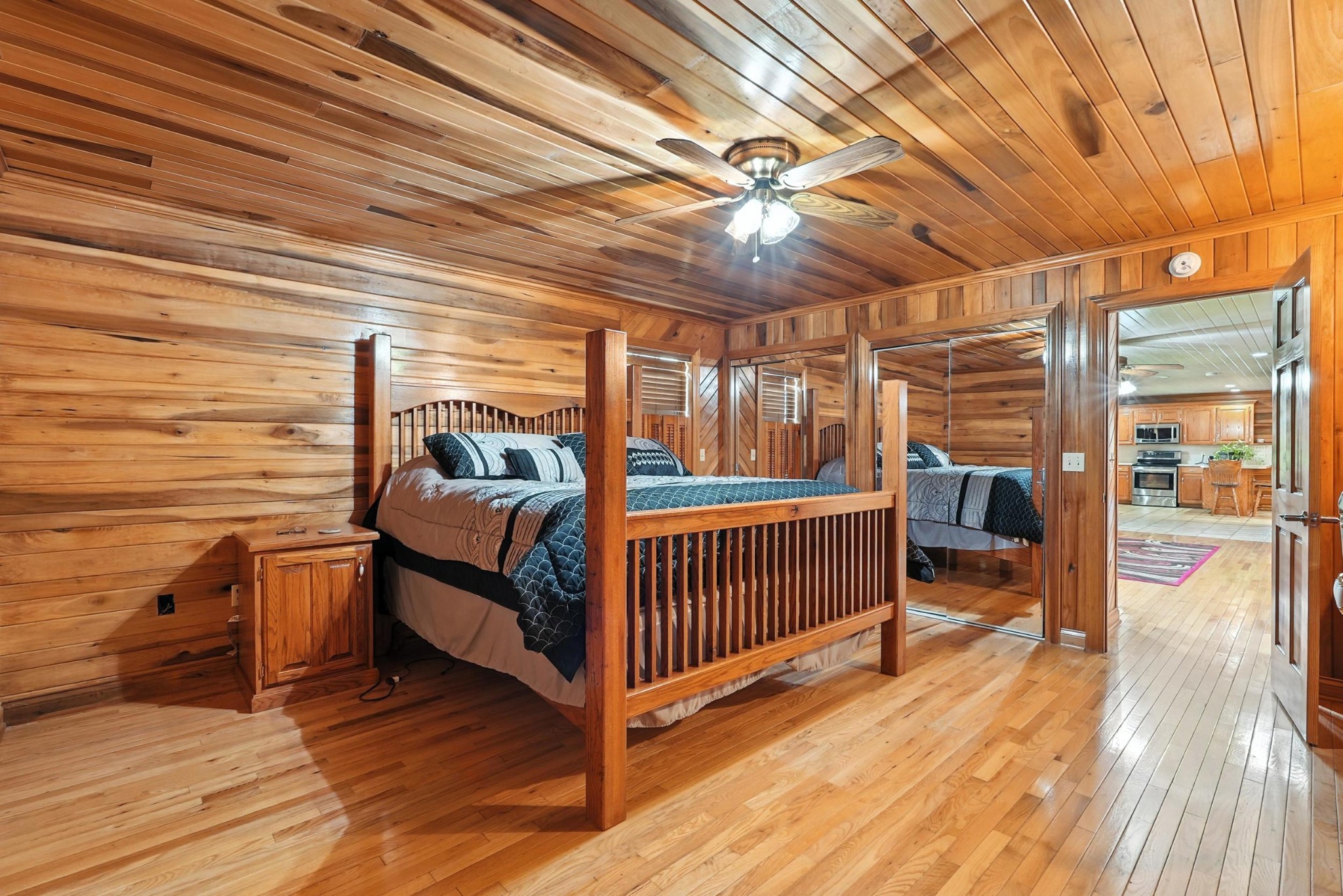 1880 Clydeton Road Waverly, TN 37185 - Photo 51 of 85 a bedroom with furniture and a wooden floor