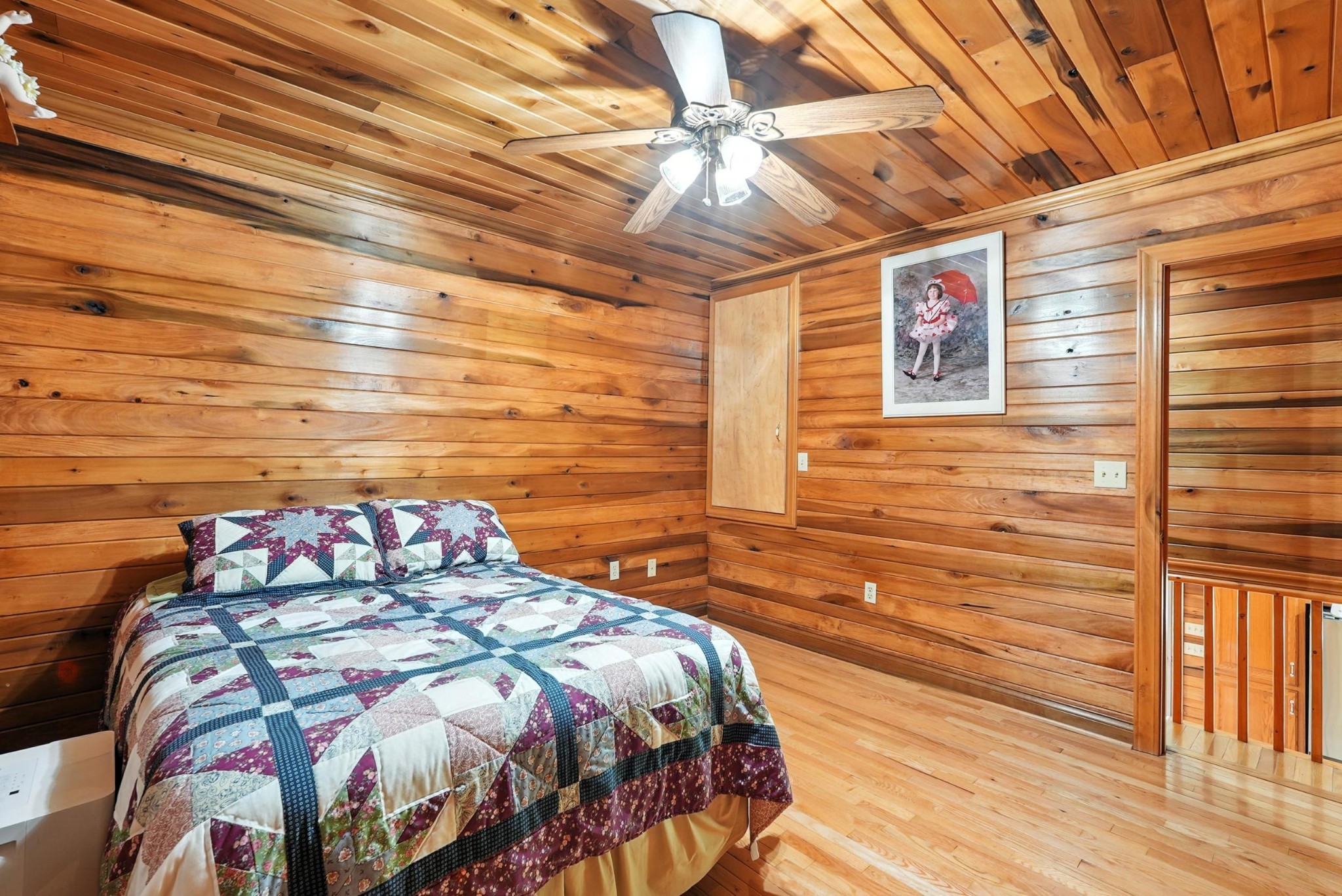 1880 Clydeton Road Waverly, TN 37185 - Photo 55 of 85 a bedroom with a bed and a view of balcony