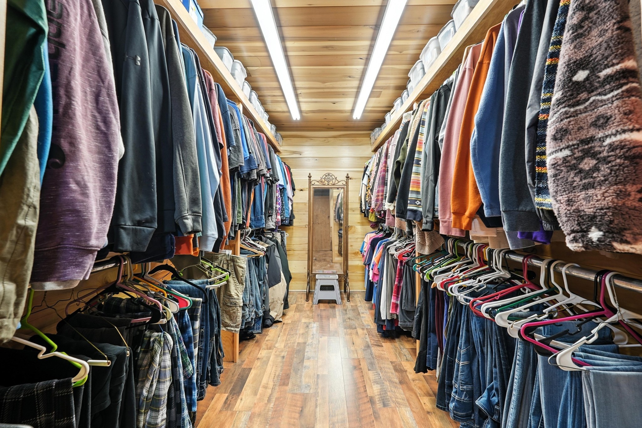 1880 Clydeton Road Waverly, TN 37185 - Photo 60 of 85 a view of walk in closet with clothes and shoes
