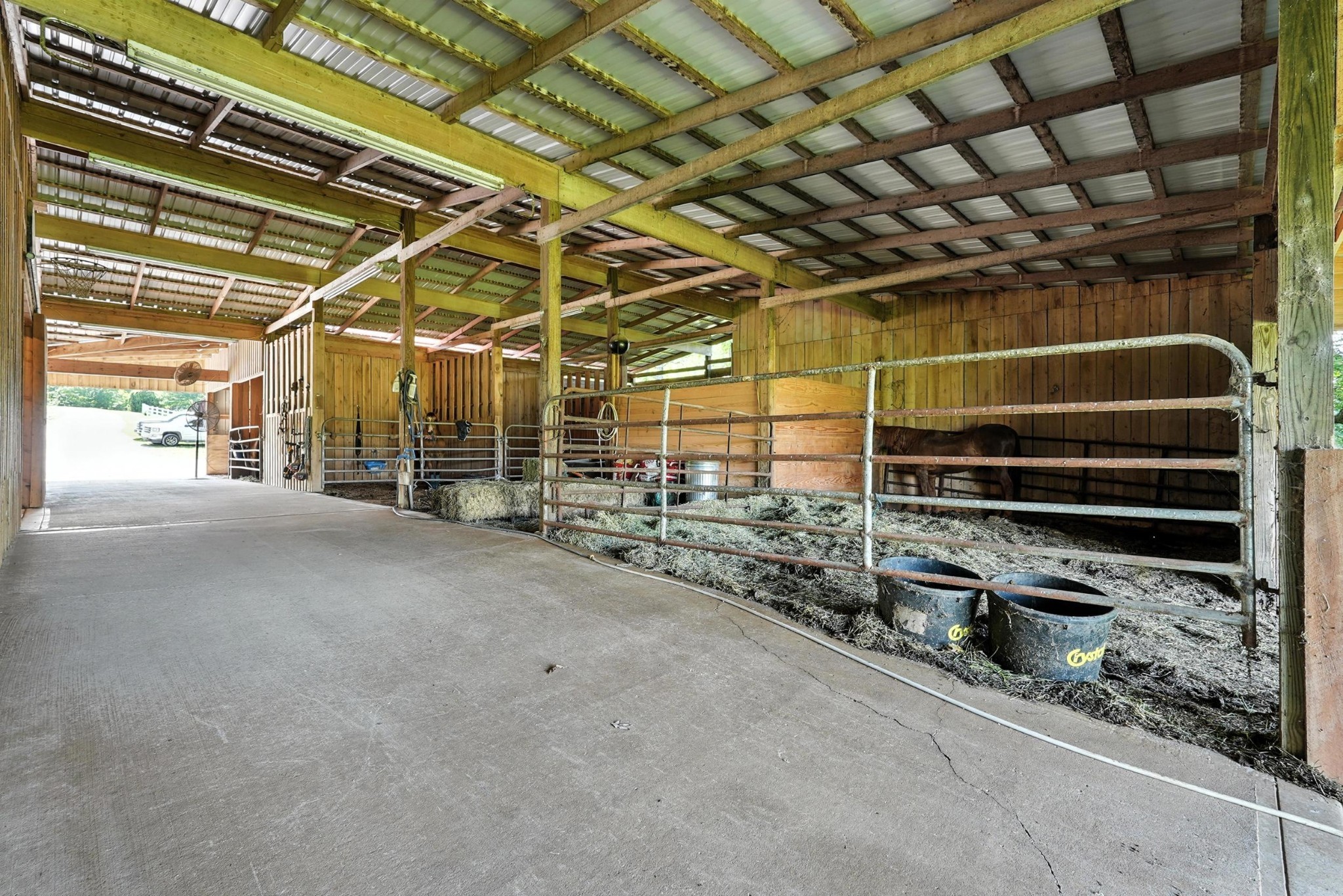 1880 Clydeton Road Waverly, TN 37185 - Photo 63 of 85 a view of an empty room with racks on the wall