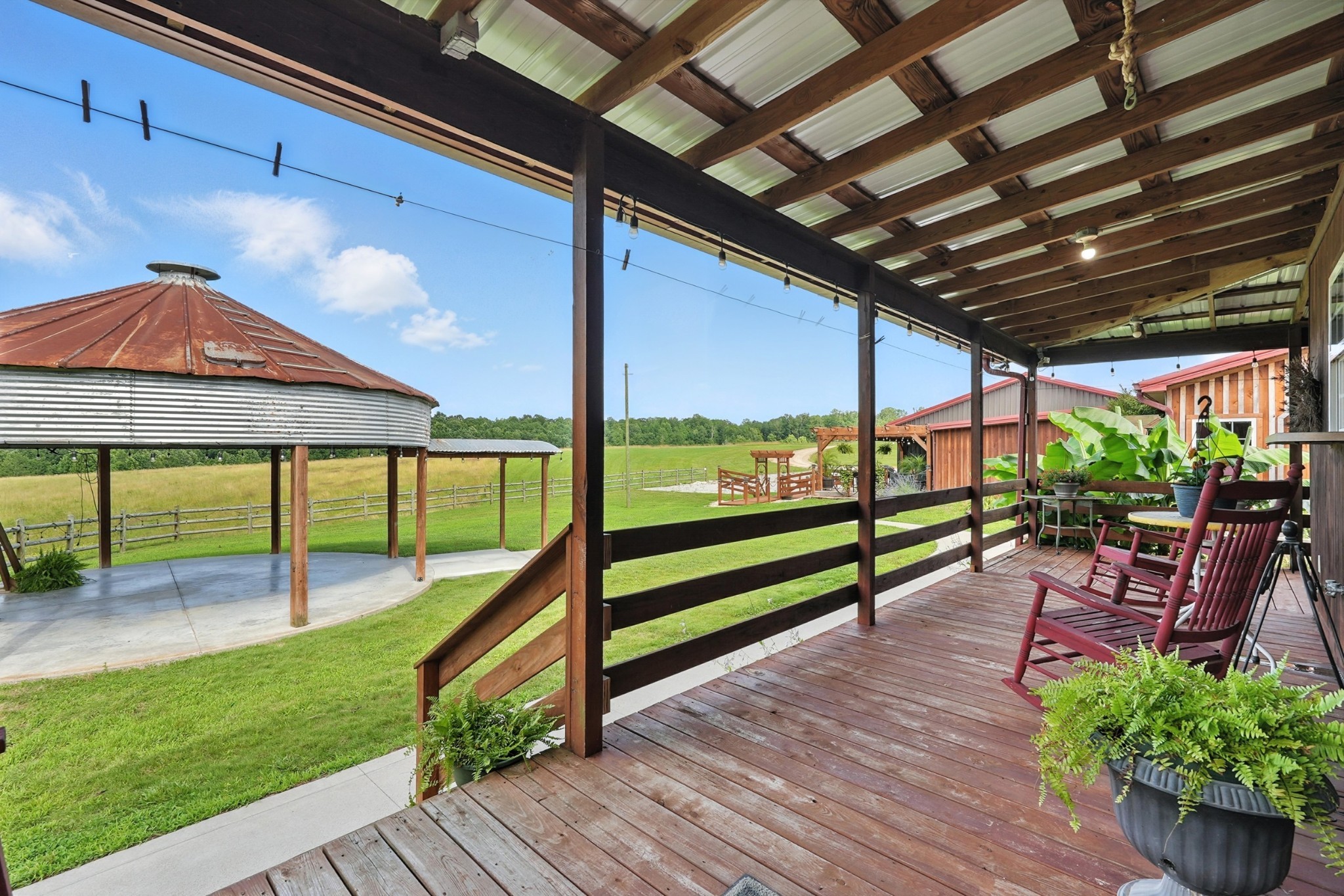 1880 Clydeton Road Waverly, TN 37185 - Photo 66 of 85 a view of a porch with furniture and garden view