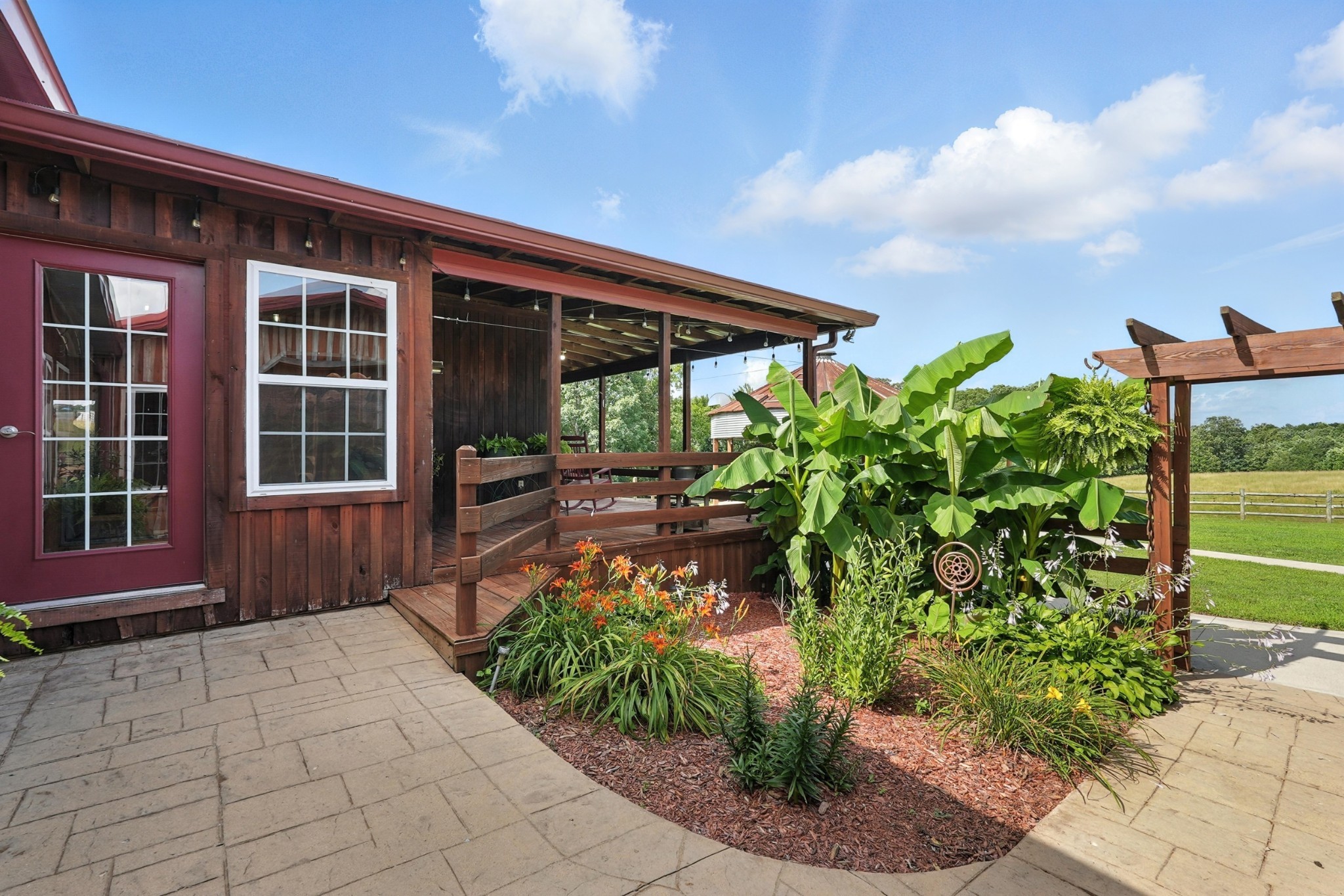 1880 Clydeton Road Waverly, TN 37185 - Photo 68 of 85 a front view of a house with garden