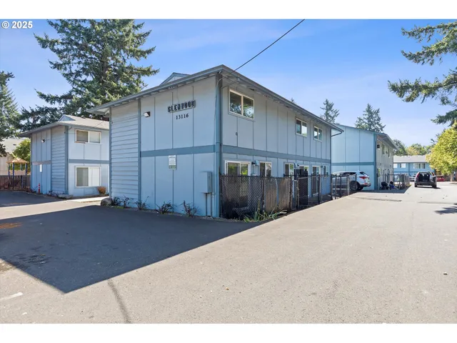 a view of a house with a street