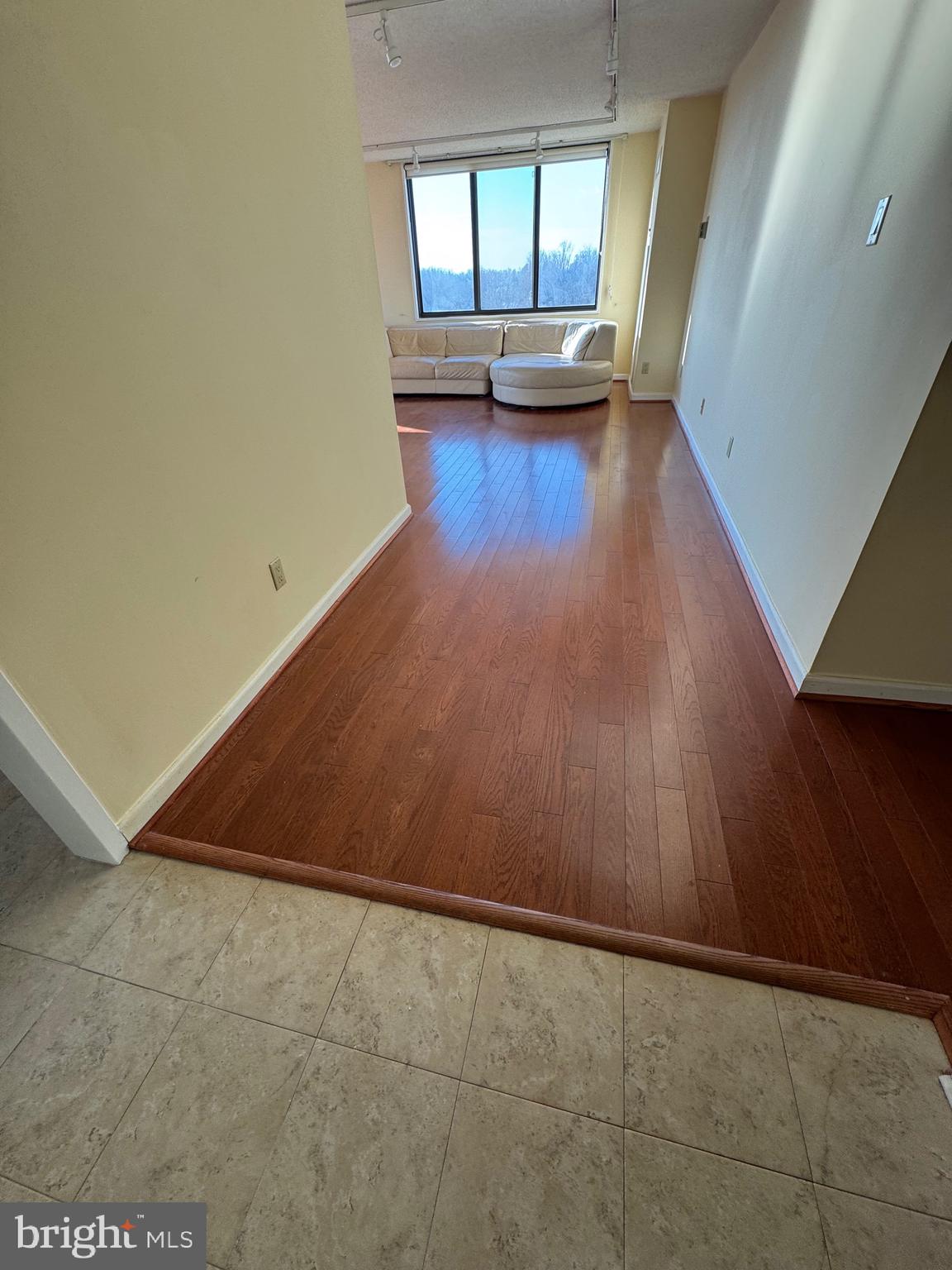 5225 Pooks Hill Road, Unit 1128S Bethesda, MD 20814 - Photo 52 of 61 a view of a living room and floor to ceiling window