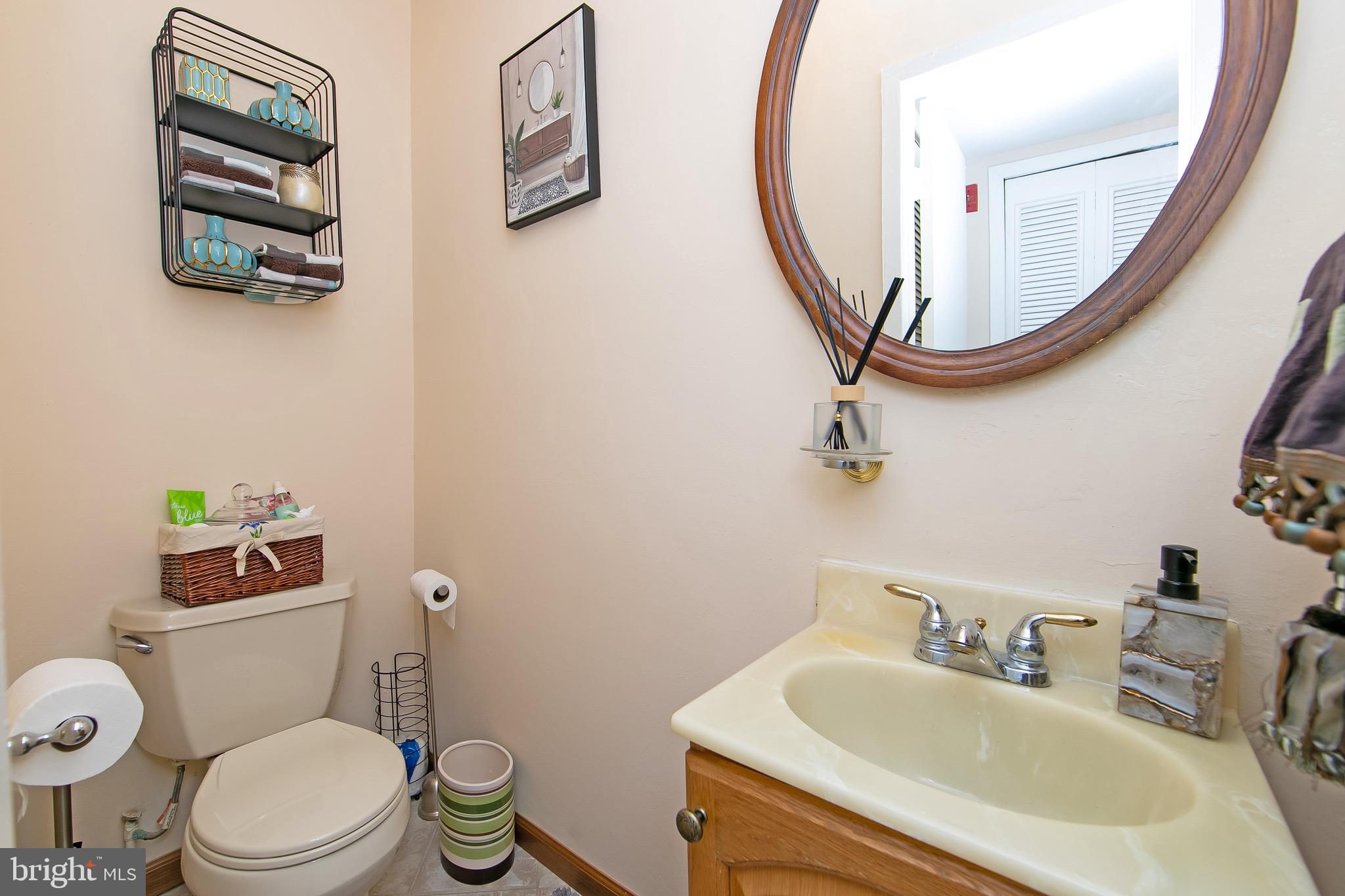 40 Rittenhouse Drive Willingboro, NJ 08046 - Photo 13 of 32 a bathroom with a toilet sink and mirror