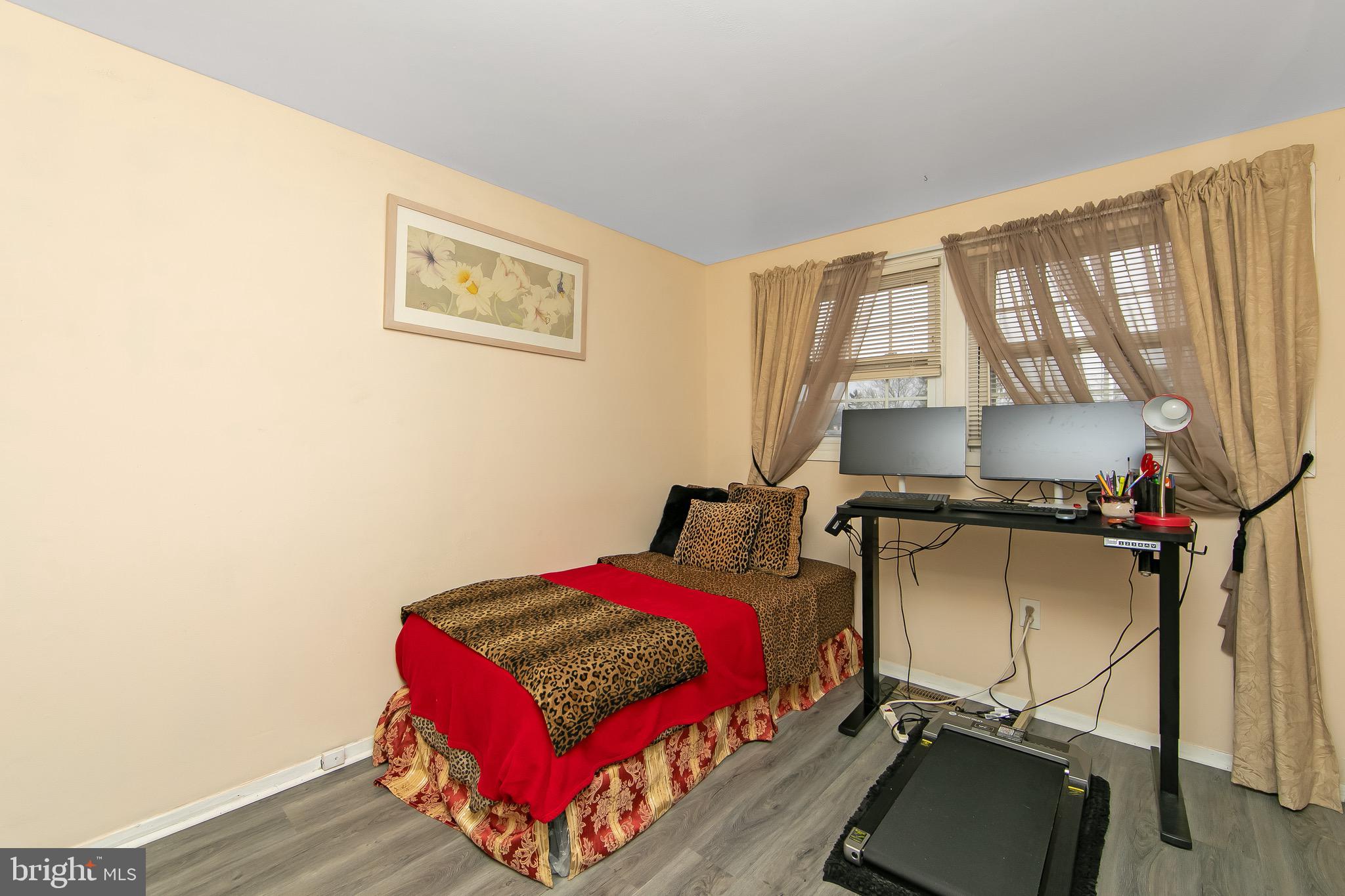 40 Rittenhouse Drive Willingboro, NJ 08046 - Photo 20 of 32 a bedroom with a bed and wooden floor