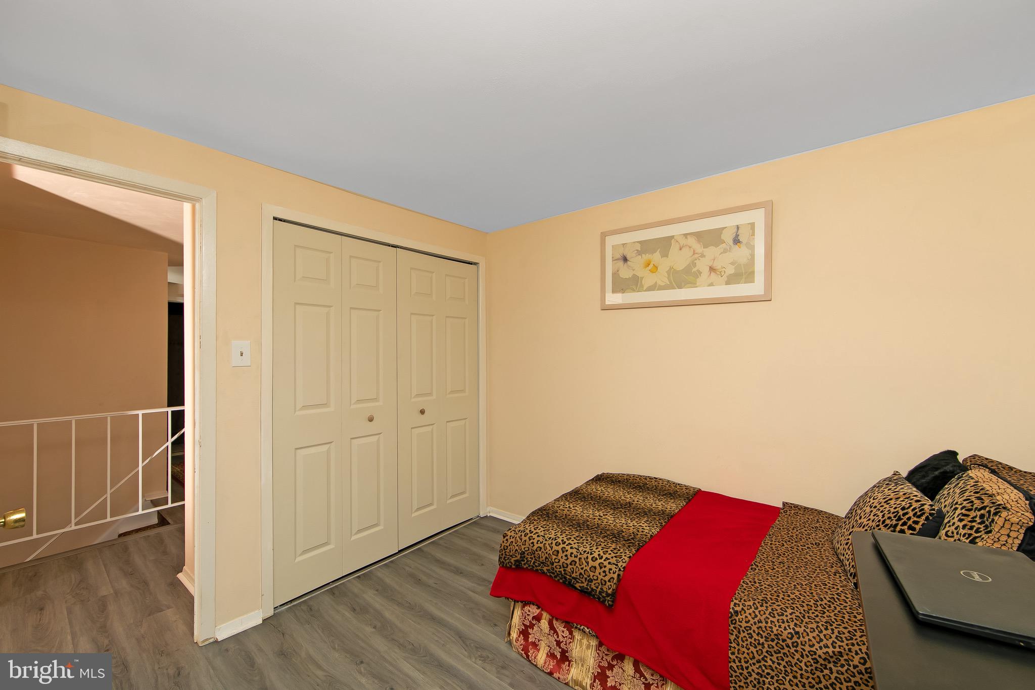 40 Rittenhouse Drive Willingboro, NJ 08046 - Photo 22 of 32 a bedroom with a bed and wooden floor