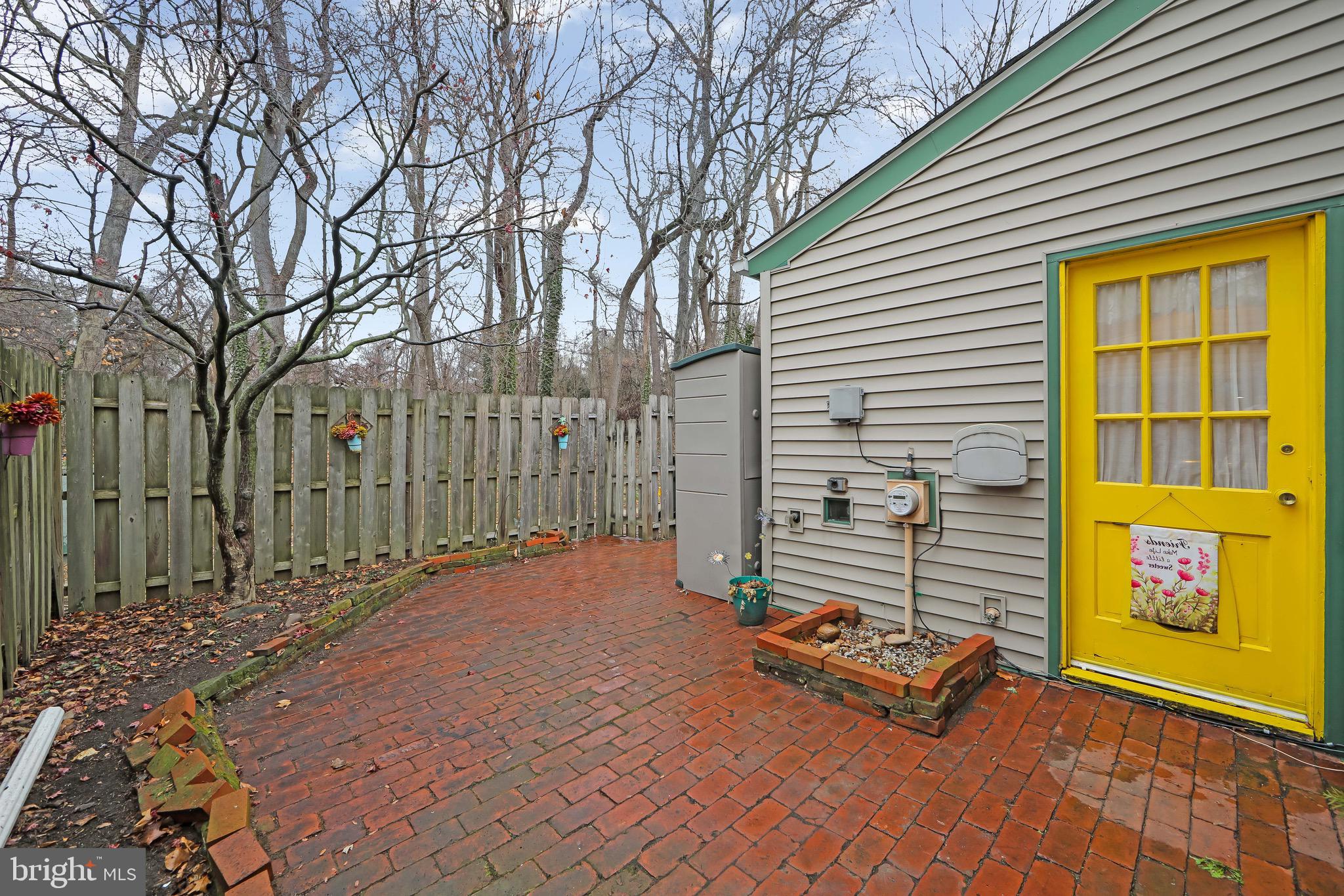 40 Rittenhouse Drive Willingboro, NJ 08046 - Photo 24 of 32 a bench is sitting in front of a house