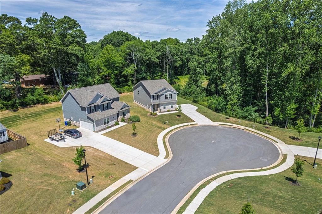 635 Meadows Farm Way Monroe, GA 30655 - Photo 4 of 36 swimming pool view with a backyard space