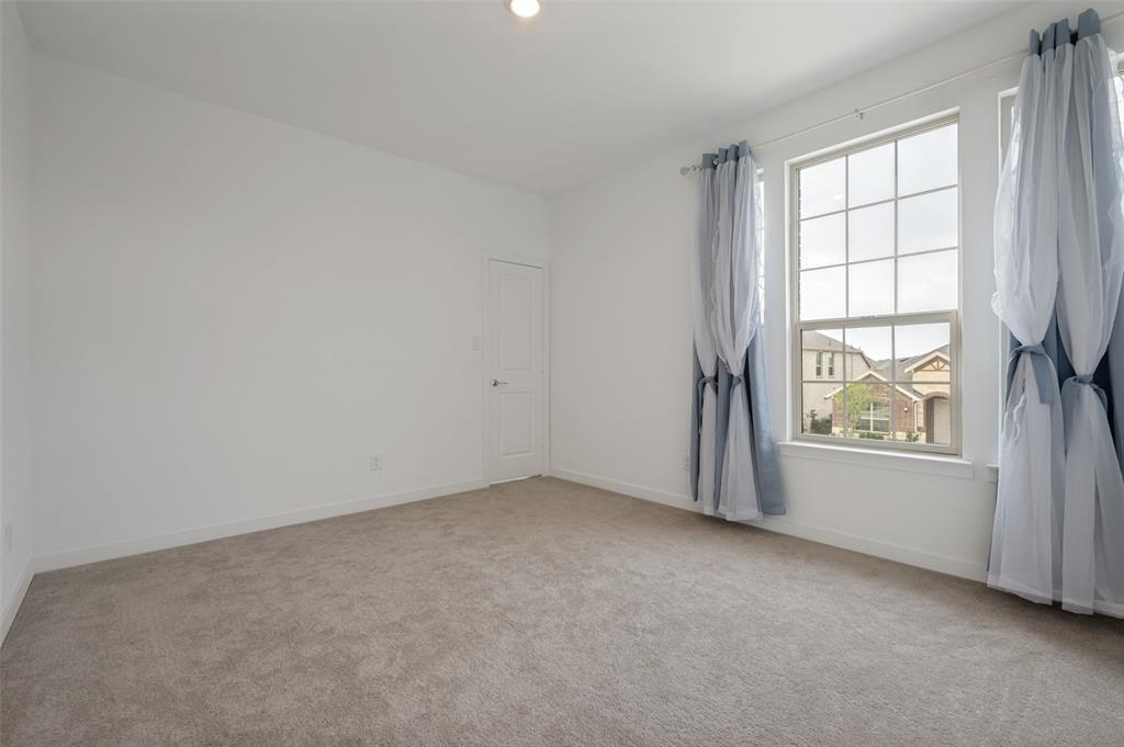108 Invermore Drive Little Elm, TX 75068 - Photo 13 of 19 an empty room with windows