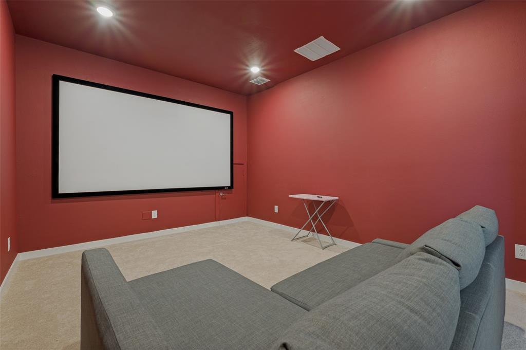 108 Invermore Drive Little Elm, TX 75068 - Photo 15 of 19 a projector room with a bed