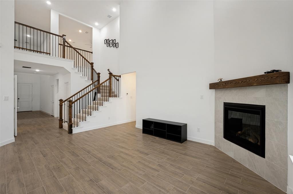 108 Invermore Drive Little Elm, TX 75068 - Photo 2 of 19 a view of entryway and hall with wooden floor