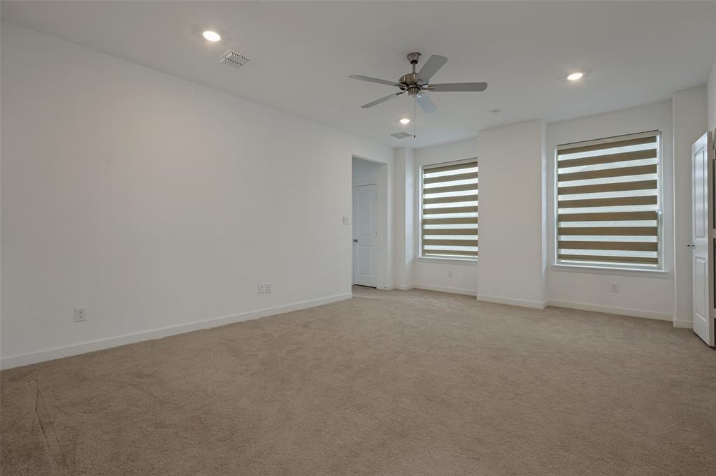 108 Invermore Drive Little Elm, TX 75068 - Photo 9 of 19 a view of an empty room with a window