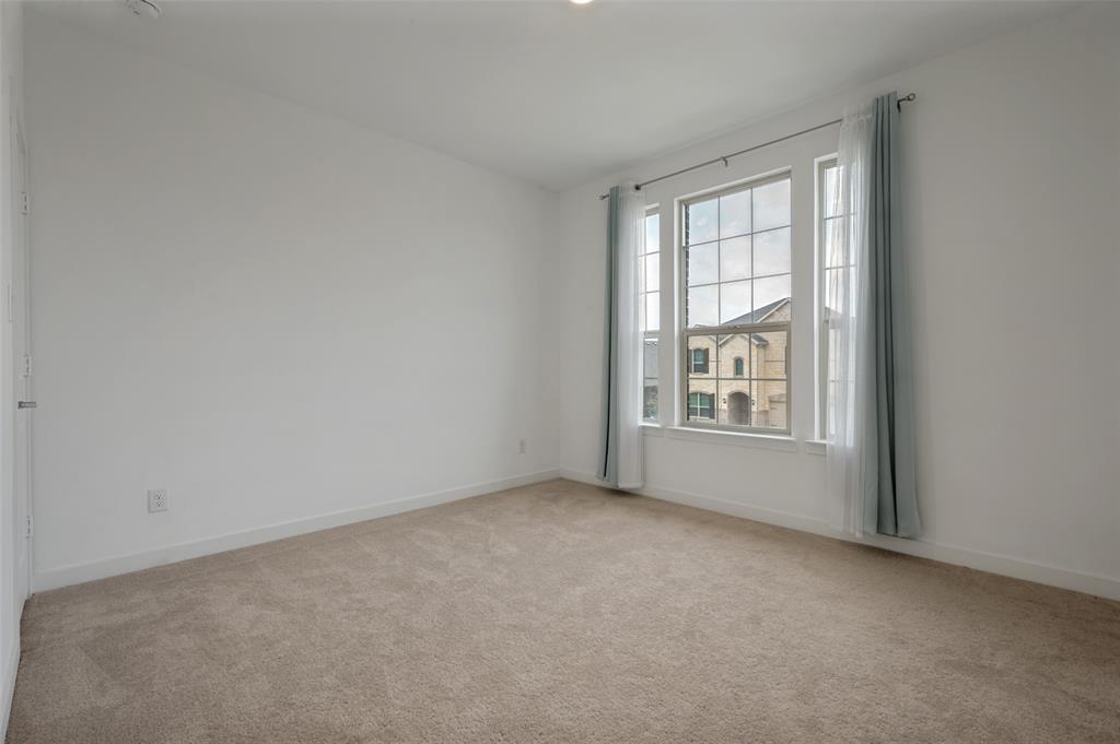 108 Invermore Drive Little Elm, TX 75068 - Photo 10 of 19 an empty room with windows