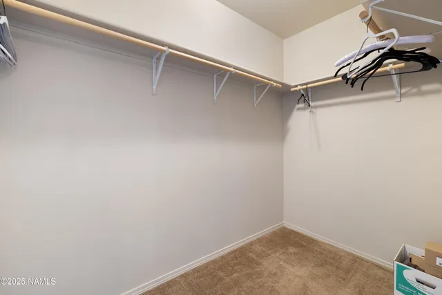 a view of a room with racks on the wall