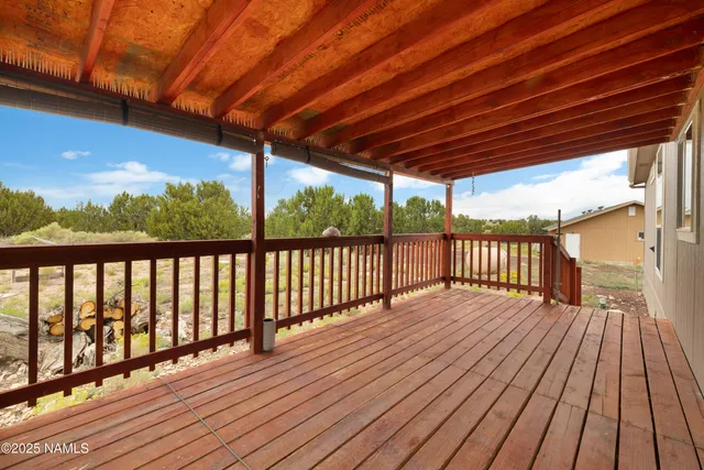 a view of backyard with a large window