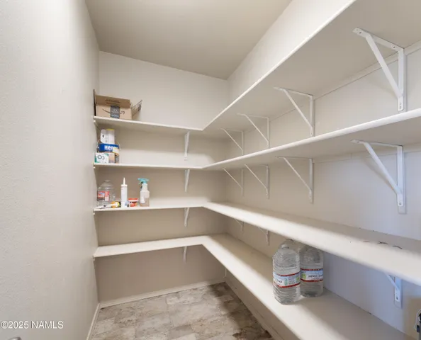 a view of a house with a snow in the background