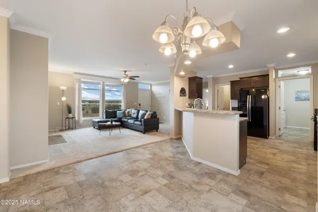 a view of a kitchen and a window