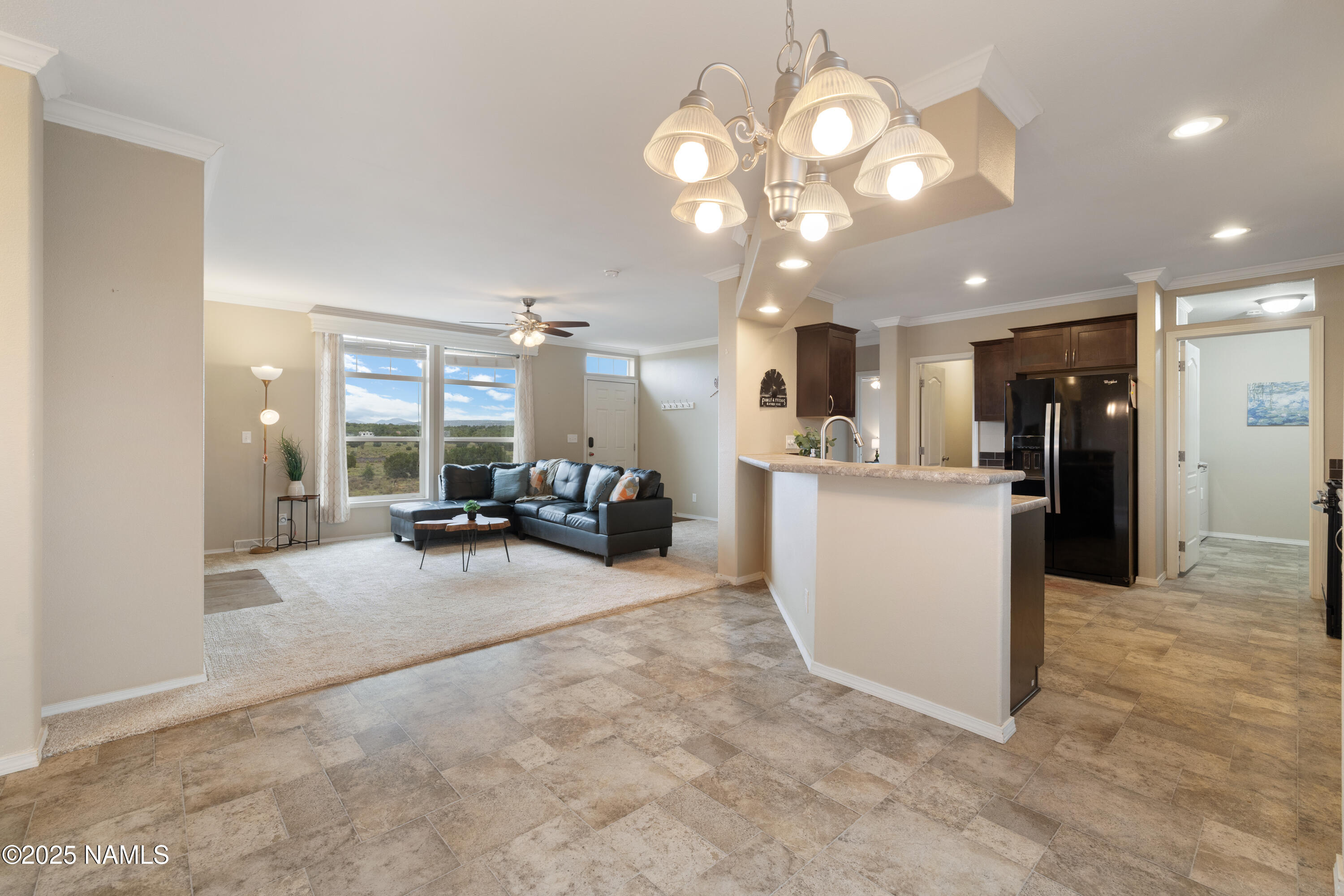 8060 Latigo Road Williams, AZ 86046 - Photo 8 of 39 Dining room overlooking living room