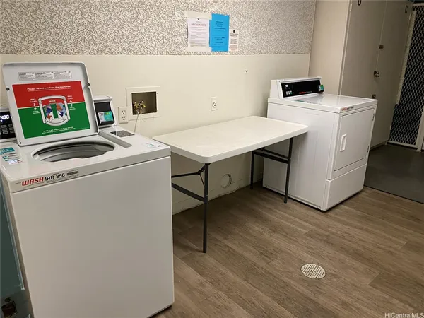 a utility room with dryer and washer