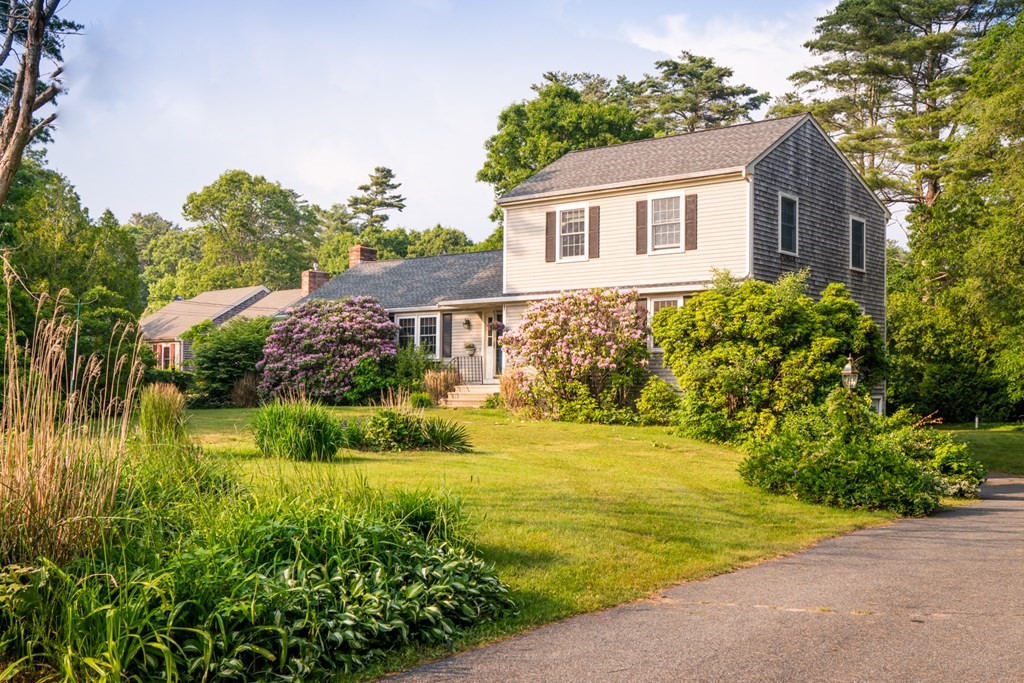 324 Nye Road Barnstable, MA 02632 - Photo 1 of 37 a view of a house with a yard and plants