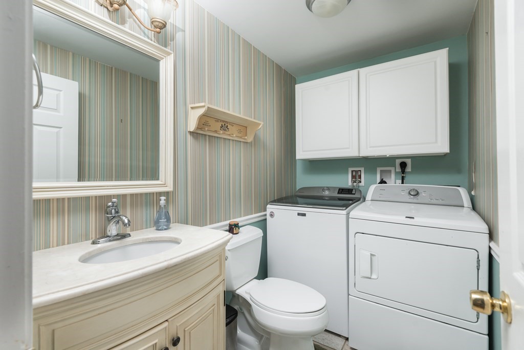 324 Nye Road Barnstable, MA 02632 - Photo 12 of 37 a view of bathroom with a sink toilet and a mirror