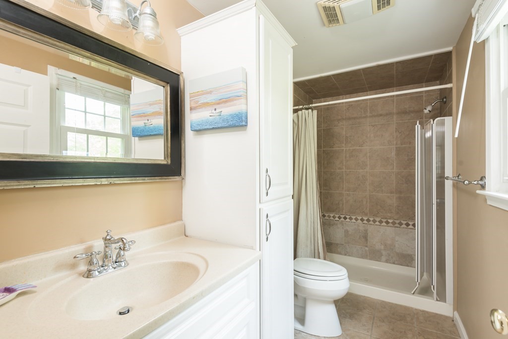 324 Nye Road Barnstable, MA 02632 - Photo 13 of 37 a bathroom with a sink toilet and shower