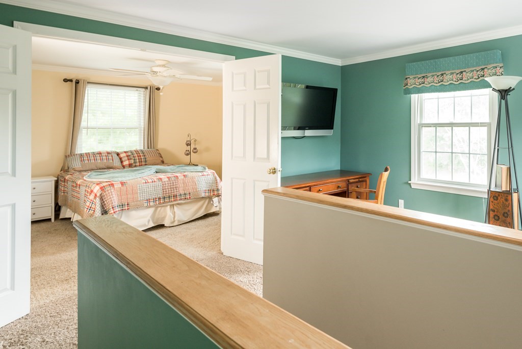 324 Nye Road Barnstable, MA 02632 - Photo 18 of 37 a living room with furniture and a flat screen tv