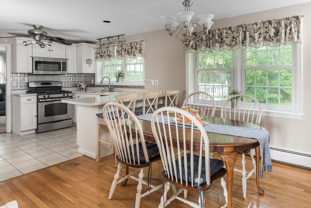 324 Nye Road Barnstable, MA 02632 - Photo 2 of 37 a view of a dining room with furniture window and outside view