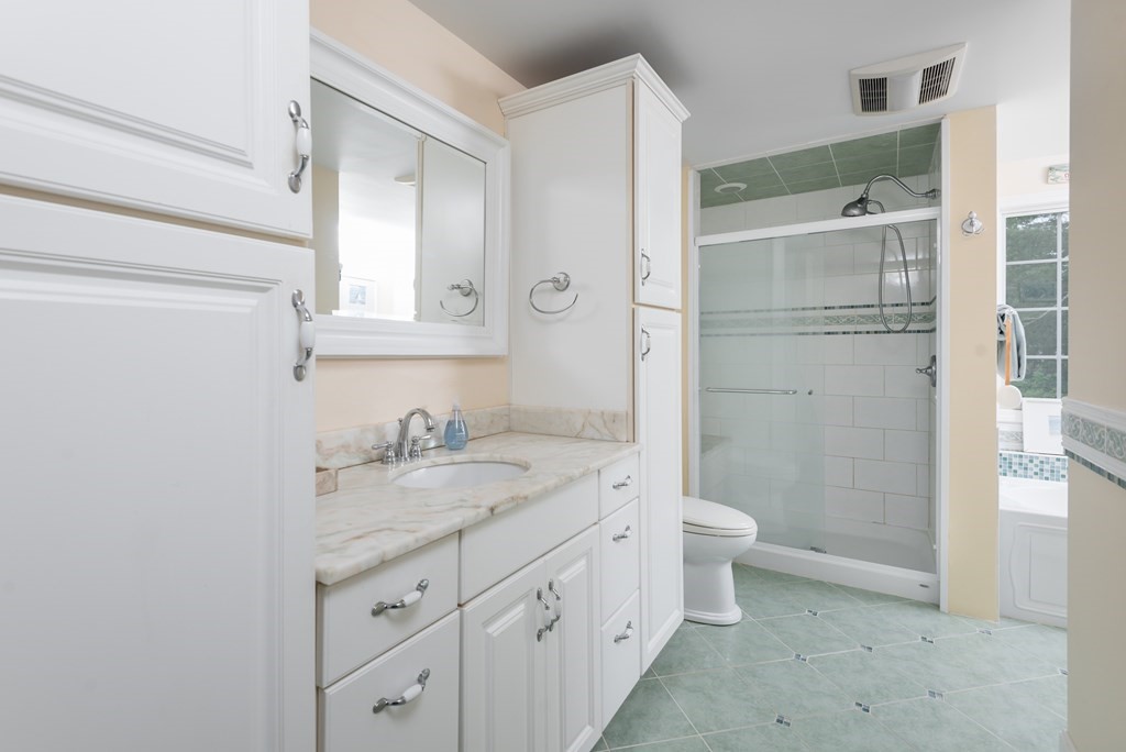 324 Nye Road Barnstable, MA 02632 - Photo 22 of 37 a bathroom with a granite countertop sink toilet and shower