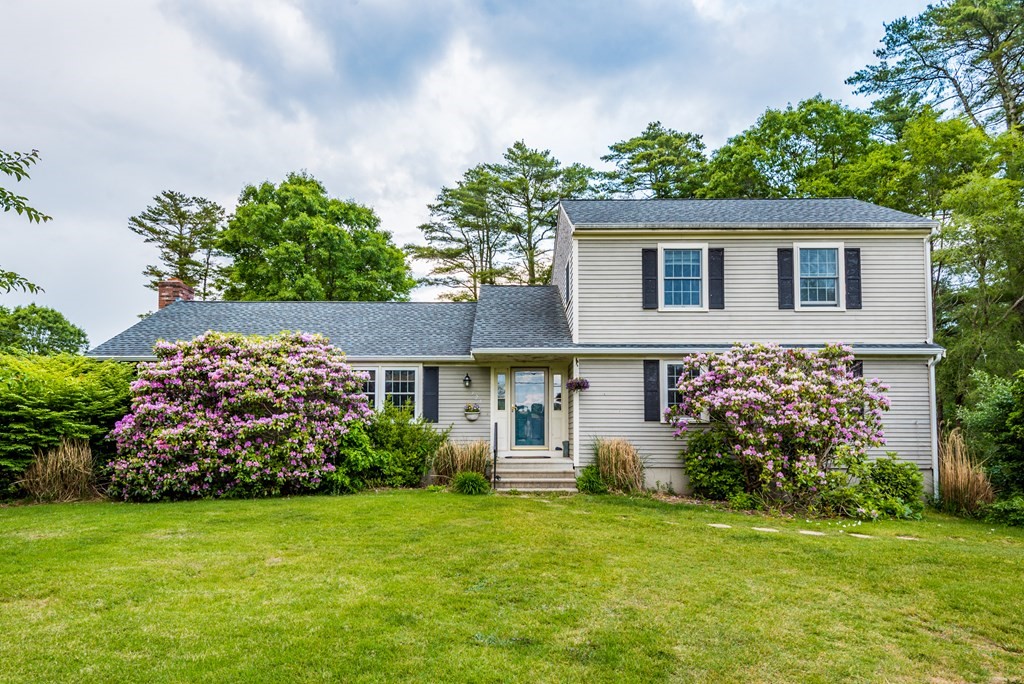 324 Nye Road Barnstable, MA 02632 - Photo 32 of 37 a front view of a house with garden