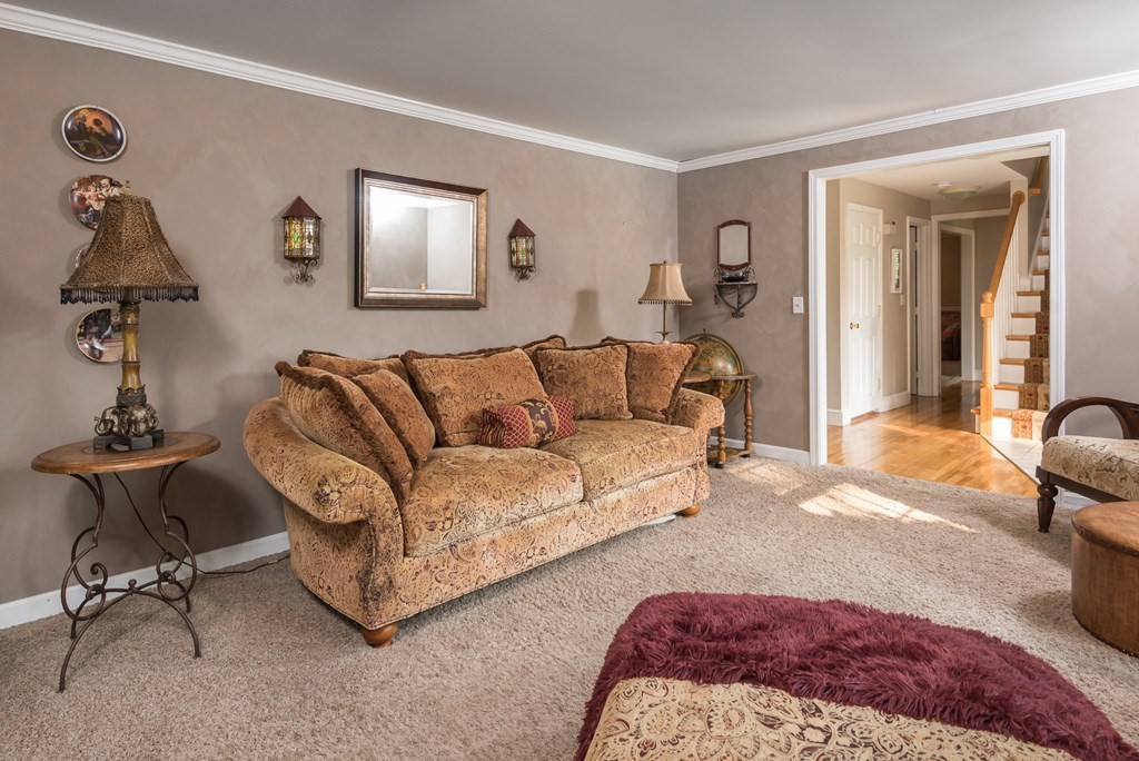 324 Nye Road Barnstable, MA 02632 - Photo 9 of 37 a living room with a couch and a dresser