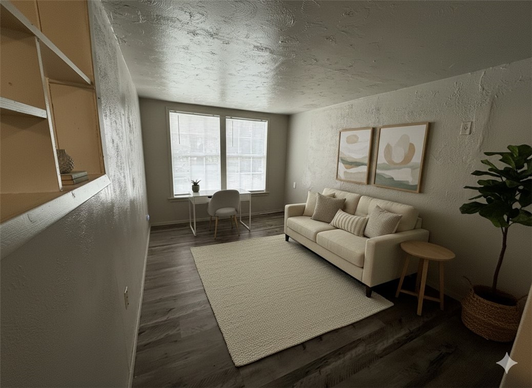 1302 East 23rd Street Bryan, TX 77803 - Photo 13 of 23 a living room with furniture and a large window