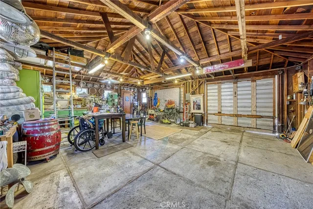 a view of a workspace with furniture