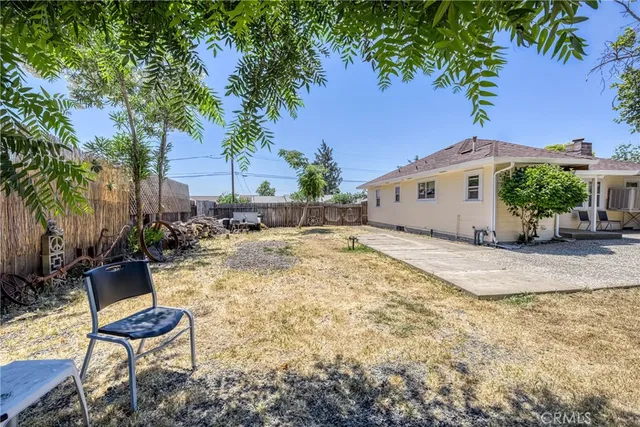 an aerial view of a houses with a lake view