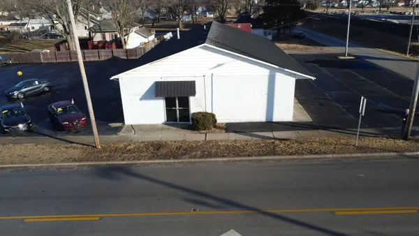 a view of a house with a porch