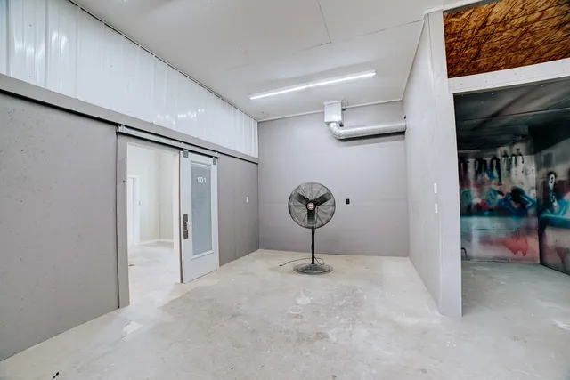 a view of empty room with windows